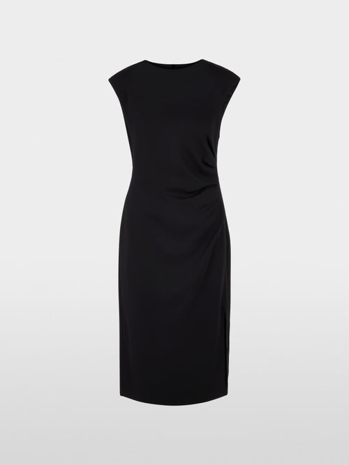 Dress with asymmetrical details