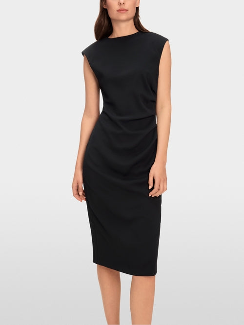 Dress with asymmetrical details