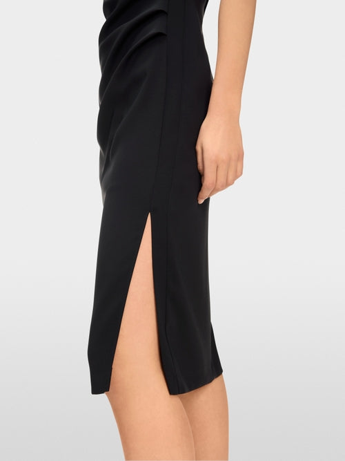 Dress with asymmetrical details