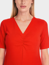 Plain feminine T-shirt with gathering