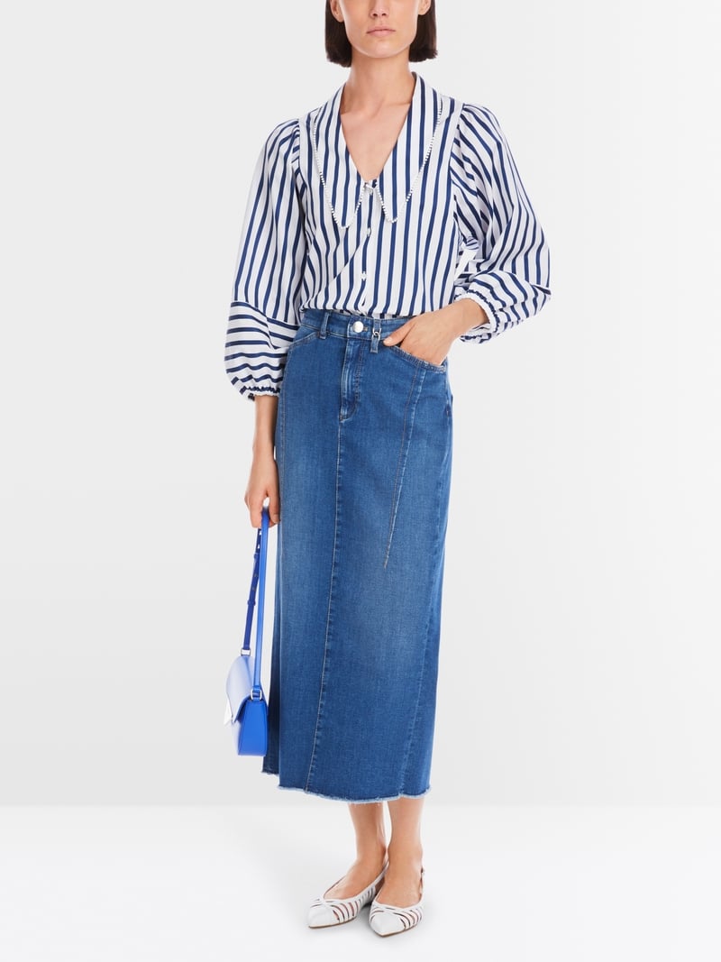 Blouse with tasselled trim