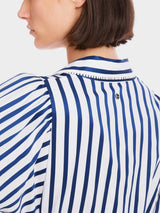 Blouse with tasselled trim