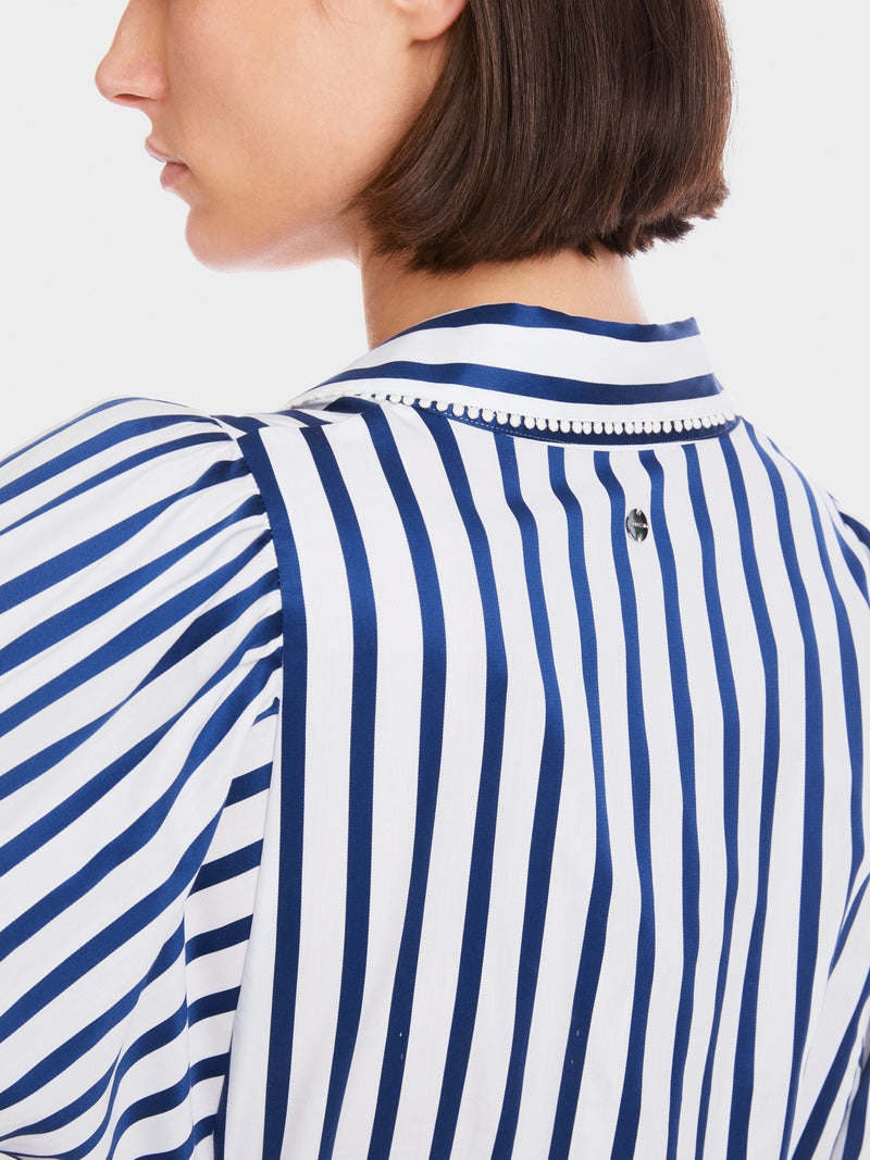 Blouse with tasselled trim
