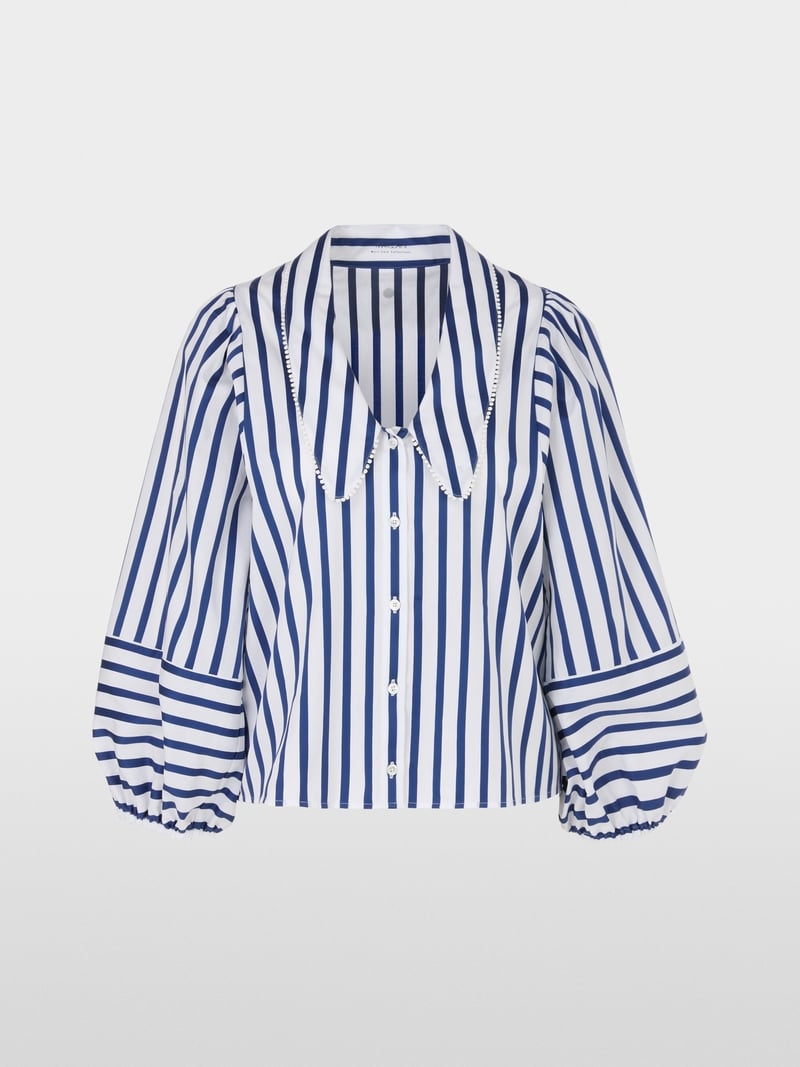 Blouse with tasselled trim