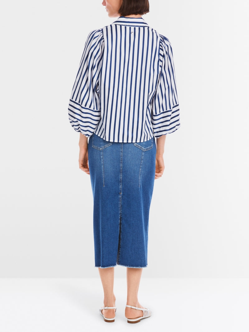 Blouse with tasselled trim